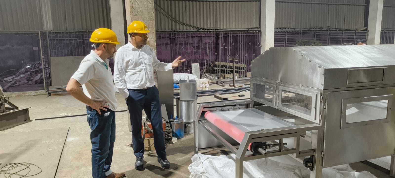 Client from Australia visiting Genex Tech Industries for machinery procurement.